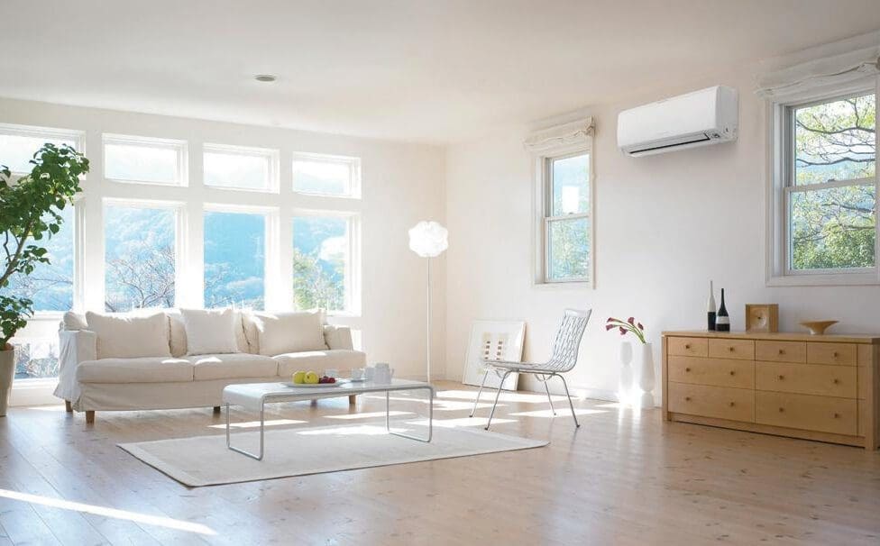 A Mitsubishi Mini Split system is displayed in an Eco Temp HVAC customer's living room after a new installation.